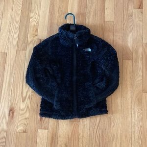 North Face Girls Jacket size small. Black fuzzy pink lined coat.